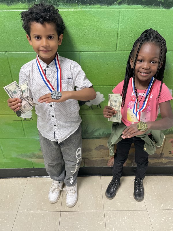 Kindergarteners Ava Posey (1st place) and Carlos Rodriguez (2nd place) won money for the American Legion Post 81 Veterans Day Coloring Contest. Congratulations!